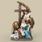 11" Holy Family with Cross Stable Figure.  Dimensions: 11.25"H x  7"W x 3.125"D. Materials: Resin/Wollastonite Powder