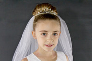Tiara veil with rhinestone circlet base embellished with pearls, crystal flowers and more. 2 layers of tulle. 