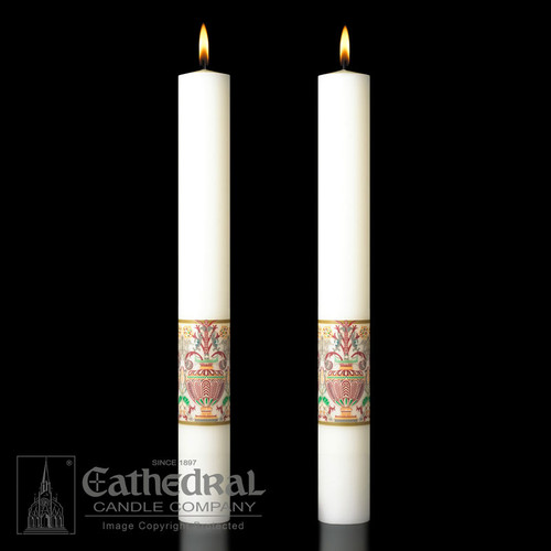 Investiture Side Altar Candles. Enhance the Presence of the Paschal Candle-a perfect decorative touch! 51% Beeswax ~ Made in the US.
Add beauty to your sanctuary with the Investiture Side Altar Candles.
• These altar candles perfectly complement the Investiture Paschal candle.
• Candles are available in sets of two.
• Colored bands around the base of the candles add a vibrant blueish-purple and shining silver to your sanctuary.
• Candles are made with 51% beeswax for a clean burn.
• Choose from four different sizes.
• Candles are made in the US.
Purchase these and other church supplies you need from St. Jude Shop.

 