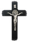 This silver Benedictine crucifix on a 12" black stained wooden cross forms the lid for a box with a small vial for holy water and two candles nestled inside. Packaged in a deluxe gift box

 

 