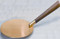 Communion/Server Paten: 7" Diameter Paten with Walnut stained hardwood handle. Satin finish Gold lacquered