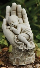 In the Palm of His Hand Garden Statue.  Made of a resin/stone mix. Dimensions: 11.25"H x 5.75"W x 7.5"D