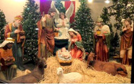 An indoor nativity display showing the entire Heaven’s Majesty set which includes the holy family, the wise men, shepherds, the angel, and some barn animals too. Nativity is made of fiberglass and resin construction with outdoor paint. Full round traditionally colored fiberglass figures with removable Jesus. Breathtakingly beautiful detail makes this traditional, fiberglass nativity an elegant edition to your Church or home decor! 