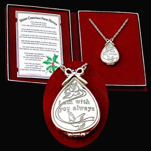 Silver locket with engraving "I am with you always" (box includes a copy of the poem). The beautifully designed gift box has been designed to hold a loved one's picture beside the bookmark with the Merry Christmas from Heaven poem. 