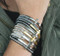Crystal Cross Wrap is Crafted of Rhodium/18K Gold Plate, Faux Suede and Crystals. Magnetic Closure. Black, Tan or Gray.

 