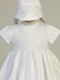 Embroidered white satin gown with sequins and beads. Comes with matching bonnet.   XS(3-6m), S(6-12m), M(9-12m), L(12-18m) & XL(18-24m).  Made in USA. 

 