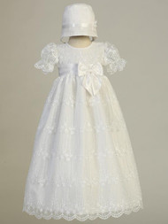 Camila Christening Gown is made of embroidered tulle with bow on waist. Comes with the bonnet.  Made In USA