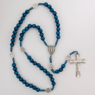 Blue wood beads with silver ox crucifix and center. Silver oxidised Miraculous Medal and Our Father Beads. Plastic gift box. Made in Italy.