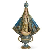 14" statue of Virgin of San Juan De Lagos. Resin/Stone Mix. 14"H x 8.5"W x 4"D. Our Lady of San Juan de los Lagos is a statue and a popular focus for pilgrims. It is located in the state of Jalisco, in central Mexico. The statue is venerated both in Mexico and the United States. The small town of San Juan de los Lagos is one of the most visited pilgrimage shrines in Mexico.
