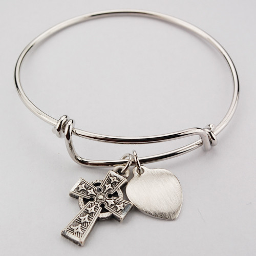 Adult Faith Bangle. This pewter 2 3/4" diameter Faith Bangle holds a Celtic Cross and a Heart charm. The heart charm can be engraved with 3 initials only for an additional cost. 