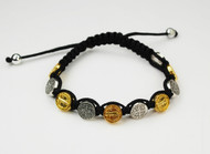 Black Corded silver and gold St Benedict medals bracelet. Adjustable sizes.  Comes carded