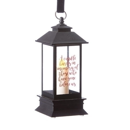 5" LED Battery operated Black Memorial Lantern. The Memorial lantern is black and is made of plastic. Saying on the lantern says: "A candle burns in memory of those who have gone before us."Dimensions are: 2.25" x 2.25"L x 5"H. Batteries are not included. 

