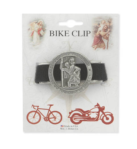 Go Your Way in Safety St. Christopher Catholic Bike Clip. Pewter bike clip measures 1 1/4" x 1 1/2". Bike clip has an antique finish. Manufactured in USA
