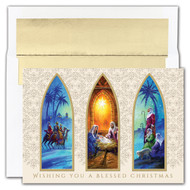 Christmas Triptych Boxed Christmas Cards.  CHRISTMAS TRIPTYCH cards feature gold foiling and embossing. Inside Sentiment: "AS THE WORLD REJOICES IN THE WONDERS OF HIS LOVE, MAY YOU BE BLESSED WITH A WONDERFUL CHRISTMAS AND WITHEVERY HAPPINESS IN THE NEW YEAR."  16 cards/16 foil lined envelopes. Folded Card Size: 5.625" x 7.875". Packaged in a printed box with an inside fit acetate lid. 
