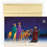 THREE KINGS boxed Christmas cards feature gold foil. Inside Sentiment: "MAY THE HOPE THAT WAS BORN THAT SILENT, HOLY NIGHT REMAIN IN YOUR HEART THROUGHOUT THE YEAR. MERRY CHRISTMAS"
18 cards/18 foil lined envelopes. Folded Card Size: 7.875" x 5.625". Packaged in a box with an acetate lid