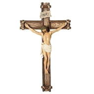 10" Wood-like wall crucifix. Made of a resin/dolomite. 
