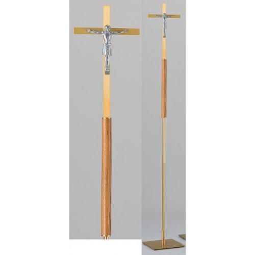 Aluminum cross, gold lacquered, with silver colored corpus. Shaft made from brass, bronze laquered, wood accents shown in medium stain color. Square steel bases are gold powder coated. Separates at base for procession. Measures 74" in height. MADE IN THE USA!