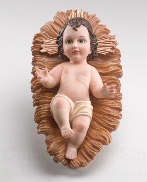 Baby Jesus in a manger two piece figurine. 