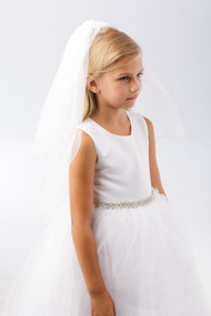 A first communion veil with a simple corded edge.