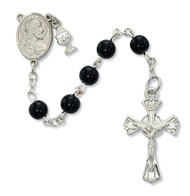 This 18" long Communion Rosary has 6mm black beads, a rhodium chalice center and a rhodium crucifix. Includes a black leatherette gift box.
Dimensions: 19" X 1" X 1 1/3"