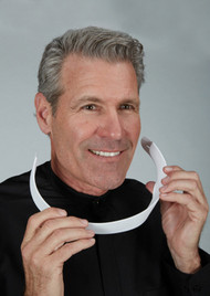 White Plastic ComfortCool Two-Ply Collar. Designed to be worn with all cassocks, shirt fronts and collarettes. Collar Height: #2 (1-1/4" H) or #3 (1-1/2" H).  Sizes: 14-19 including 1/2" sizes and 20, 21 & 22. Order size 1/2" larger than shirt collar size 