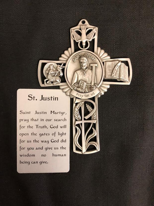 Pewter Cross with raised figures of St. Justin, Lamb, Bible and Holy Spirit. Prayer card included. Comes in a gift box.
