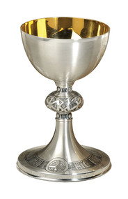 Chalice is Silver Plate with HOCEST ENIM CORPUS MEUM design along base. Chalice comes with a scale paten. Chalice stands 7.5"H, and holds 14 ounces. Chalice is made in the USA. Complementary ciborium #P-1140