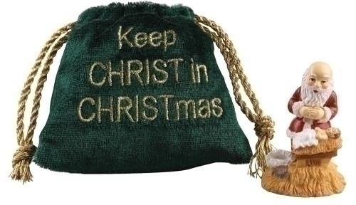 Kneeling Santa in a Velvet Bag.  Kneeling Santa comes in a velvet bag that says "Keep the Christ in Christmas. Made of a resin/stone mix.