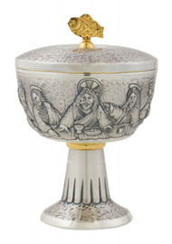 24K gold plate ciborium has the Last Supper embossing. Ciborium stands 7"H. Ciborium holds  200 hosts based on 1 3/8" host size. Complementary chalice #C-1520. Made in the USA