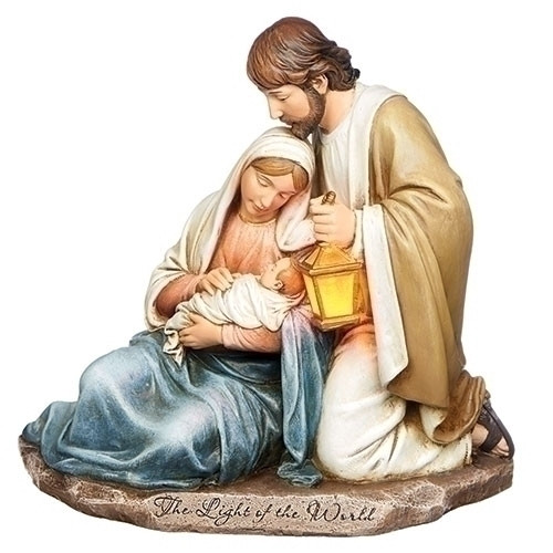 7.25" Holy Family with lit Lantern. Verse on base reads "The Light of the World" Dimensions are:7.25"H x 7.75"W x 4.5"D. Made of a resin/stone mix.