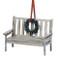 Bench with Wreath Ornament. 3" bench has a wreath on the back of chair. 3"H bench with wreath is made of medium density  fiberboard. Complete measurements are: 3"H x 4 "W x 2"D