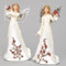 Image of the two differently positioned Angel Figures with Cardinal in a dress adorned with holly and snowflakes.