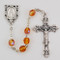 November ~ Topaz
Fired Polished Glass Birthstone Rosaries with Miraculous Medal Centerpiece. Rosary is comprised of 6 millimeter fire polished glass beads. The Centerpiece is a silver oxidised Miraculous Medal  and a silver oxidised Crucifix.  Packaged in a deluxe gift box.