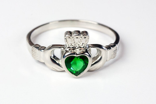  Women's Sterling Silver with Emerald Glass Accents Claddagh Ring. Sizes 4-9. Hand Made in the USA. Lifetime Guarantee against tarnishing and defects.  Also 14K gold ring available. Call for pricing