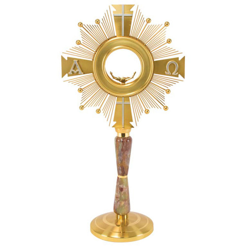 Gold plated monstrance with the cross
