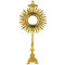 Gold plated monstrance with the cross on top