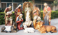 An up close look at the 12 figurines included in the set, clustered together outside. Full colored fiberglass figures. Breathtakingly beautiful detail makes this traditional Nativity an elegant edition to your church, school or institution. 12 piece 72" tall set; Infant is removable from crib. Beautiful for indoor or outdoor use. 



