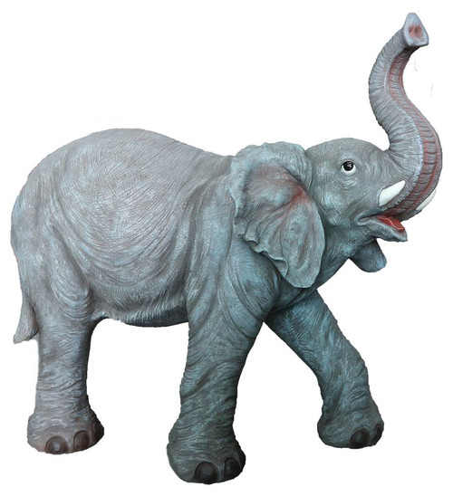 Large elephant Nativity figure with its trunk in the air. 