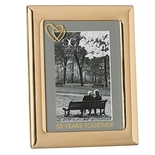 50 Years Together Photo Frame from the Caroline Collection. Frame is made of zinc alloy and is lead free. The 50 Years Together Photo Frame presents with two hearts in the upper left hand corner with 50 Years Together printed on the matting of the frame. Photo frame hold and 4 x 6 photo. 