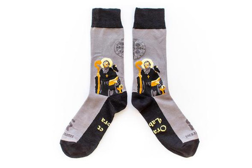 The innovator of religious orders as we know them today, St. Benedict is beloved by many! This simple design mimics the simple, humble life he lived. A raven on his shoulder and a chalice with a snake by his side, will remind you of the miraculous power of God, working to save this faithful soul from enemies attempts to poison him. These socks will be the perfect reminder to live the Benedictine motto, “Ora et Labora,” meaning pray and work, keeping all tasks in your day prayerful.