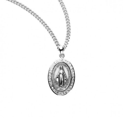 Crystal hand set crystal cubic zirconia stones on an oval sterling silver Miraculous Medal.  Dimensions: 0.9" x 0.6" (24mm x 16mm). Sterling silver miraculous medal with cubic zirconia stones comes on an 18" rhodium plated stainless steel chain with clasp. Medal comes in a deluxe velour gift box.