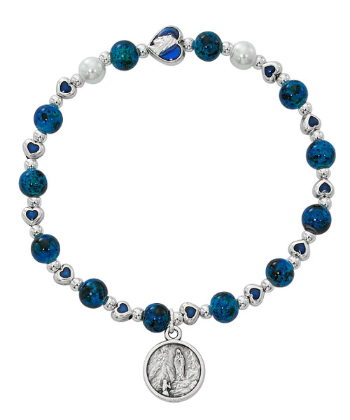 Our Lady of Lourdes Blue Hearts Stretch Bracelet. Bracelet consists of 6mm blue beads, and blue enamel hearts with silver oxidised components. 