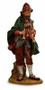 Josiah wearing traditional dress holding a set of bagpipes. Marble Based Resin. 50" Height