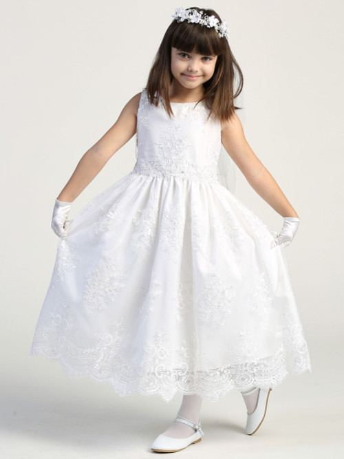 This beautiful First Communion dress features a world of detail through its corded embroidery and intricate lace design. Order yours today at St. Jude’s Shop! 
Features
Corded Embroidery Lace Tulle
Tank Length Sleeves
Zipper Closure 
Bow on Back of Dress 
This lovely First Communion dress is the perfect attire for your daughter or granddaughter. The holy white simplistic design features beautifully embroidery to create a luxurious dress for her special day! 
Tea Length 
Made in the U.S.A. 
3 Dress Limit Per Order
