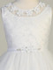 Product Description: 

This First Communion dress features detailed embroidery along the bodice with flower appliques along the neckline flowing into a tulle skirt with a lace hem. Shop this style online at St. Jude’s Shop! 
Embroidered Tulle Bodice 
Flower Applique Neckline
Rhinestone and Flower Decor at Waistline
Tulle Skirt With Embroidered Edges 
String Bow
First Communion is a momentous occasion. Your daughter or granddaughter will feel extra special in this beautifully intricate embroidered design, with floral lace appliques and Rhinestone waistline. This style ties back to create a small bow on the backside to not take away from the tulle skirt's lace hem. 
Tea Length 
Accessories Sold Separately
Made in the U.S.A. 
3 Dress Limit Per Order