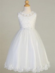 Product Description: 
This First Communion dress features detailed embroidery along the bodice with flower appliques along the neckline flowing into a tulle skirt with a lace hem. Shop this style online at St. Jude’s Shop! 

Embroidered Tulle Bodice 
Flower Applique Neckline
Rhinestone and Flower Decor at Waistline
Tulle Skirt With Embroidered Edges 
String Bow
First Communion is a momentous occasion. Your daughter or granddaughter will feel extra special in this beautifully intricate embroidered design, with floral lace appliques and Rhinestone waistline. This style ties back to create a small bow on the backside to not take away from the tulle skirt's lace hem. 
Tea Length 
Accessories Sold Separately
Made in the U.S.A. 
3 Dress Limit Per Order
