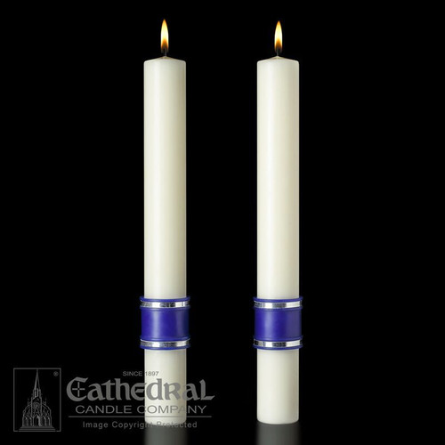 Image of two white tapered altar candles with a bluish-purple band around the base.
Add beauty to your sanctuary with the Messiah altar candles, available through St. Jude Shop.
• These altar candles perfectly complement the Messiah Paschal candle.
• Candles are available in sets of two.
• Colored bands around the base of the candles add a vibrant blueish-purple and shining silver to your sanctuary.
• Candles are made with 51% beeswax for a clean burn.
• Choose from four different sizes.
• Candles are made in the US.
Purchase these and other church supplies you need from St. Jude Shop.