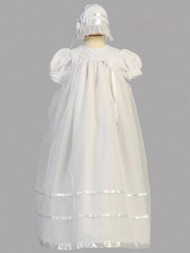 Embroidered yoke and satin ribbons adorn this long organza christening gown. Bonnet included Made in the USA.