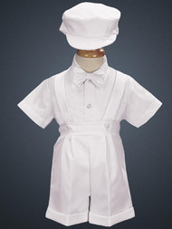 4 piece polyester suspendered short set with shirt, bowtie and hat. Available in larger sizes and in black or white. **Note: 0-3 months available in white ONLY  