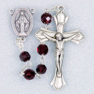 January - Garnet 
These 6mm aurora borealis glass beads are available in each birthstone month color. Rosaries are 20" long. Rosaries have a silver oxidised Madonna centerpiece and Crucifix. Rosaries come in a clear top plastic box.  Perfect gift for any occasion.

 